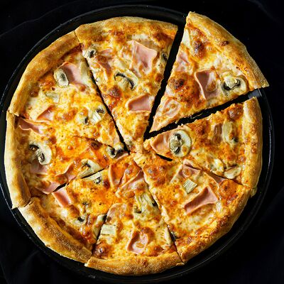 Пицца Ветчина и грибы в Temple pizza по цене 690 ₽