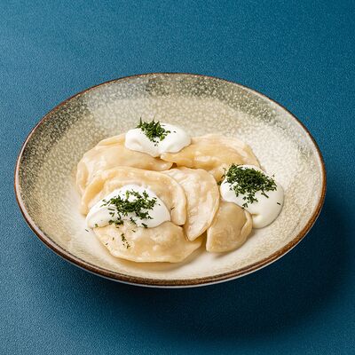 Вареники с картофелем и луком отварные в Мираж по цене 220 ₽