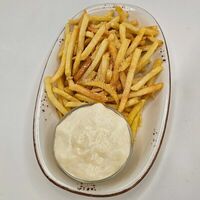 Картофель фри с сырным соусом и трюфелем в Марио траттория