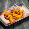 Картофельные дольки с чесноком и зеленью в Паб Мира по цене 270