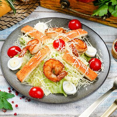 Салат Цезарь креветки в Ананури по цене 730 ₽