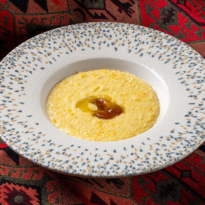 Каша пшённая с тыквой в Хмели & Сунели по цене 390 ₽