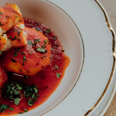 Baccalà in umido в La Piada по цене 1900 ₽