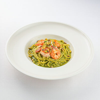 Спагетти с песто, креветками, страчателлой и фисташками в La Scala Trattoria Ignazio по цене 45 р.
