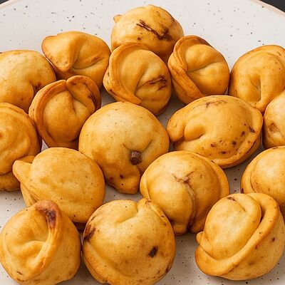 Пельмени жареные в Ческыт по цене 429 ₽