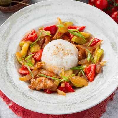 Свинина с рисом и соусом свит чили в Кофейня №1 по цене 420 ₽