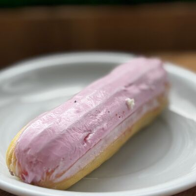 Эклер манго-маракуйя в Кофейня Barista по цене 132 ₽