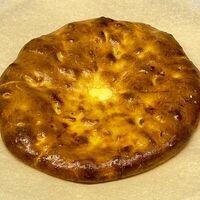 Пирог осетинский с сыром, творогом и зеленью в Дол-Хлеб