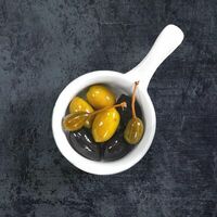 Ассорти оливок в Остерия Il Massimo