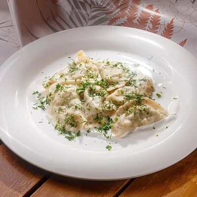 Вареники с капустой и мясом в Лентяйка по цене 190 ₽