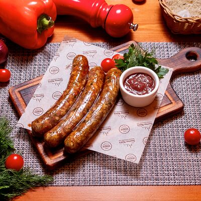 Колбаска из баранины с соусом Ткемали в Золотая прага по цене 1430 ₽