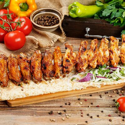 Шашлык из куриных крылышек Xl в Grill VIP House по цене 1000 ₽