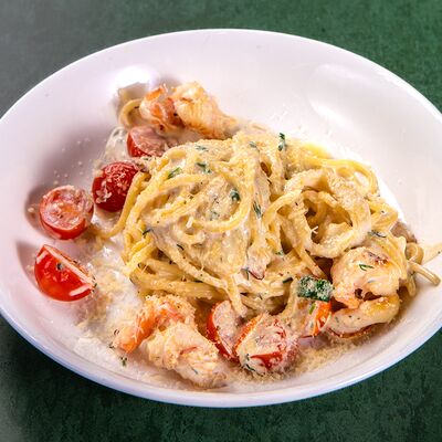 Паста сливочная с морепродуктами в Oreganos по цене 890 ₽