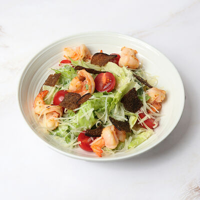 Салат Цезарь с курицей в MOGU по цене 670 ₽