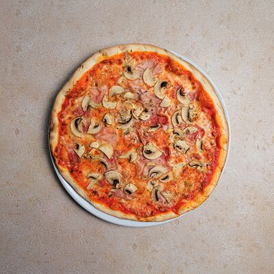Пицца с ветчиной и грибами в Bocconcino по цене 1580 ₽