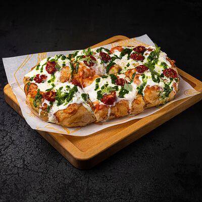 Пиццетта с песто и страчателлой в Прага по цене 860 ₽