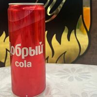 Добрый cola в Мясо на углях