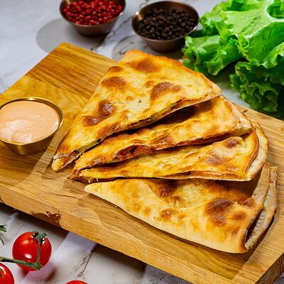 Кальцоне с ветчиной и картофелем в Кухня для друзей по цене 659 ₽