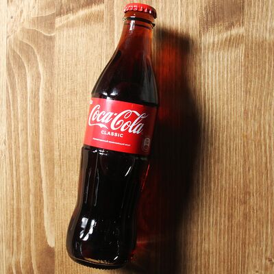 Coca-Cola в стеклянной бутылке в Mister Donerio по цене 179 ₽