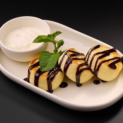 Сырники с шоколадной начинкой в COFFEEПЕЙ по цене 440 ₽