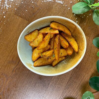 Картофель по-деревенски в Kirova street по цене 220 ₽