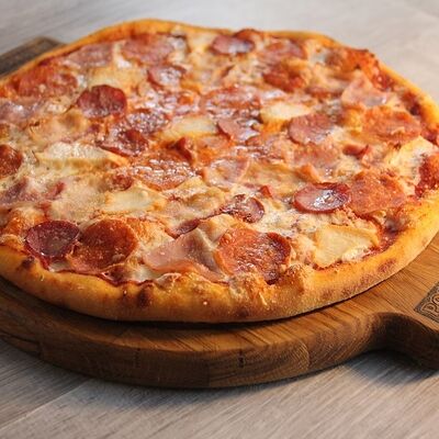 Пицца Мясная в Pomidoroff по цене 1200 ₽