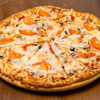 Пицца Овощная в Хлебное место №1 по цене 920 ₽