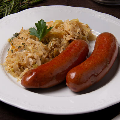 Датские сардельки с тушеной капустой в La Maison гастробутик по цене 720 ₽