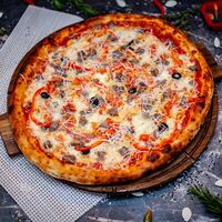 Пицца с мраморной говядиной в La Pizza Bomba на дровах