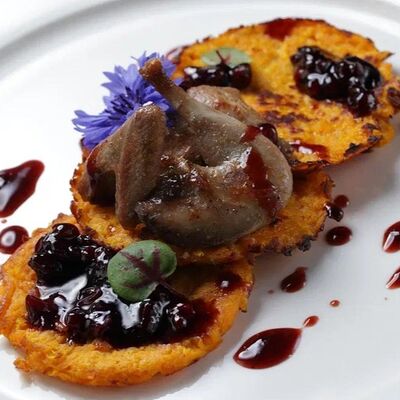 Перепёлка с тыквенными драниками и брусничным соусом в Rich Lounge по цене 800 ₽