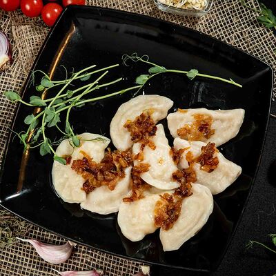 Вареники с сулугуни и творогом S в Пицца Пала по цене 275 ₽