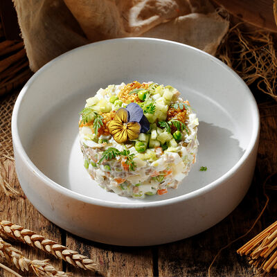 Оливье с говяжьим языком в Плюшка по цене 650 ₽