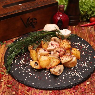 Картофель жареный с грибами в Vagr по цене 340 ₽