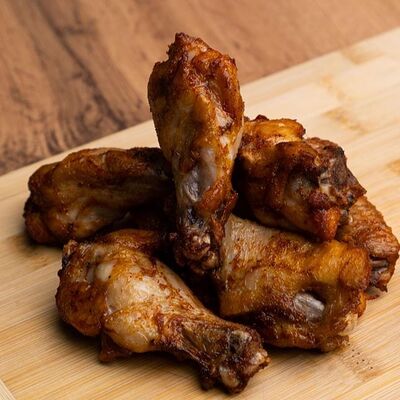 Куриные крылья с кисло-сладким соусомв BAD & BOY BURGER по цене 680 ₽