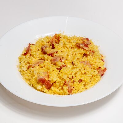 Каша пшённая с беконом и пармезаном в Абсолют по цене 320 ₽