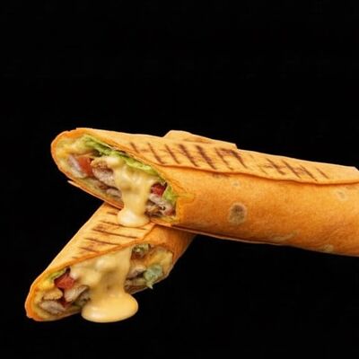 Шаурма сырная в Holy salt Шаурма Шашлык по цене 360 ₽