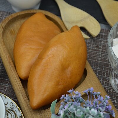 Пирожок лук-яйцо в Пышнотесто по цене 71 ₽