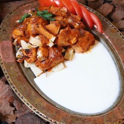 Искендер-кебаб куриный в Tawooks по цене 640 ₽