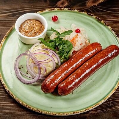 Колбаски тирольские 2 шт.в Гастробар Феллини по цене 790 ₽