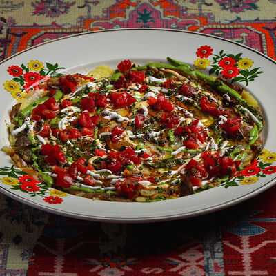 Карпаччо из печёного картофеляс томатами и соусом Амба в Saviv по цене 1325 ₽