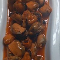 Мясо мидий под острым соусом в Пиволей