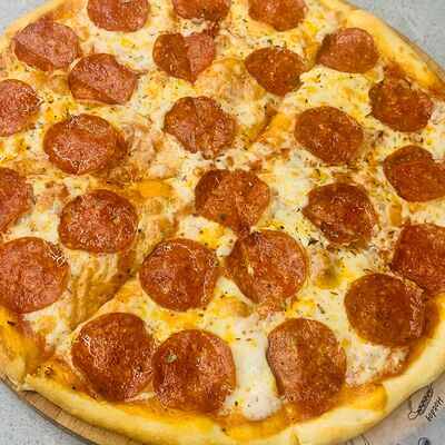 Пицца пепперони в Boochino по цене 530 ₽