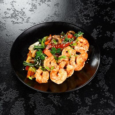 Креветки в кисло-сладком соусе с овощами в Суши Профи по цене 869 ₽