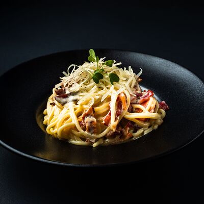 Паста Карбонара в Два веселых гуся по цене 770 ₽