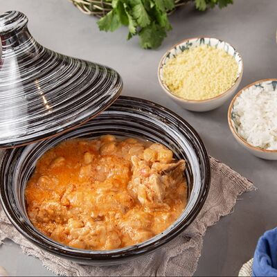 Тажин с цыпленком, нутом и сливочным соусом в Куркума по цене 870 ₽