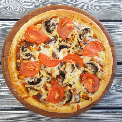 Пицца Мясная в Гиро-пицца по цене 510 ₽