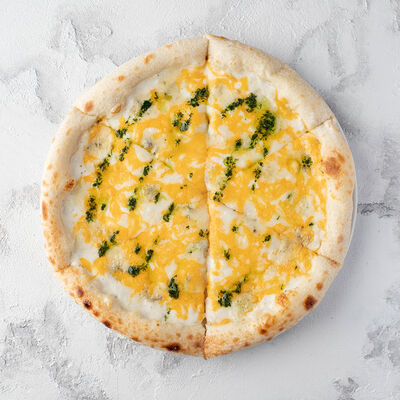 Пицца Четыре сыра 28см в АндерСон по цене 680 ₽