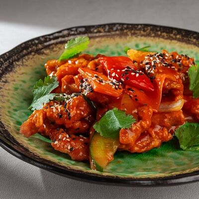 Свинина в кисло-сладком соусе в Sarang по цене 539 ₽