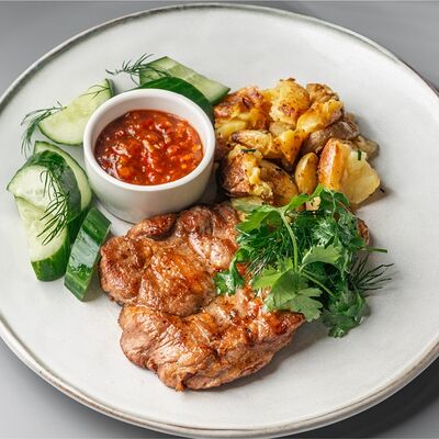 Стейк из свиной шеи в BEERMAN&Schlitz по цене 870 ₽