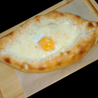 Хачапури по-аджарски в Пицца МАФИЯ по цене 520 ₽